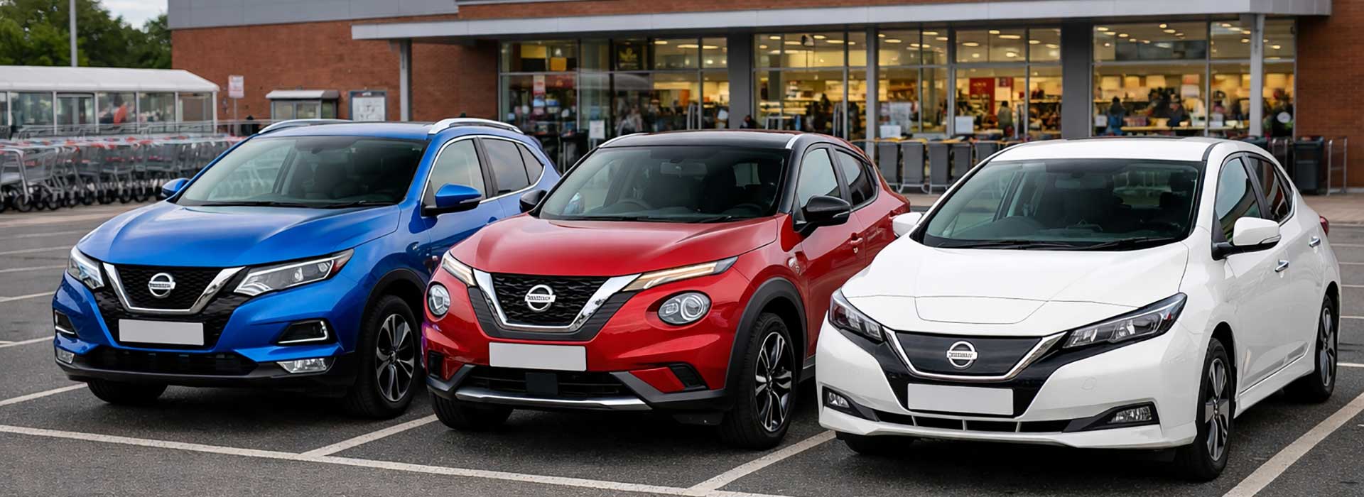 Nissan cars outside a supermarket